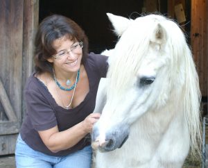 Michaela Ghisletta mit Pferd